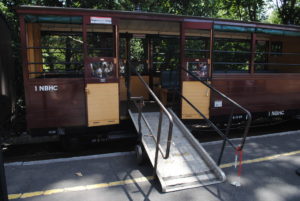 Accessible carriage with ramp attached so wheelchair users can board the carriage.