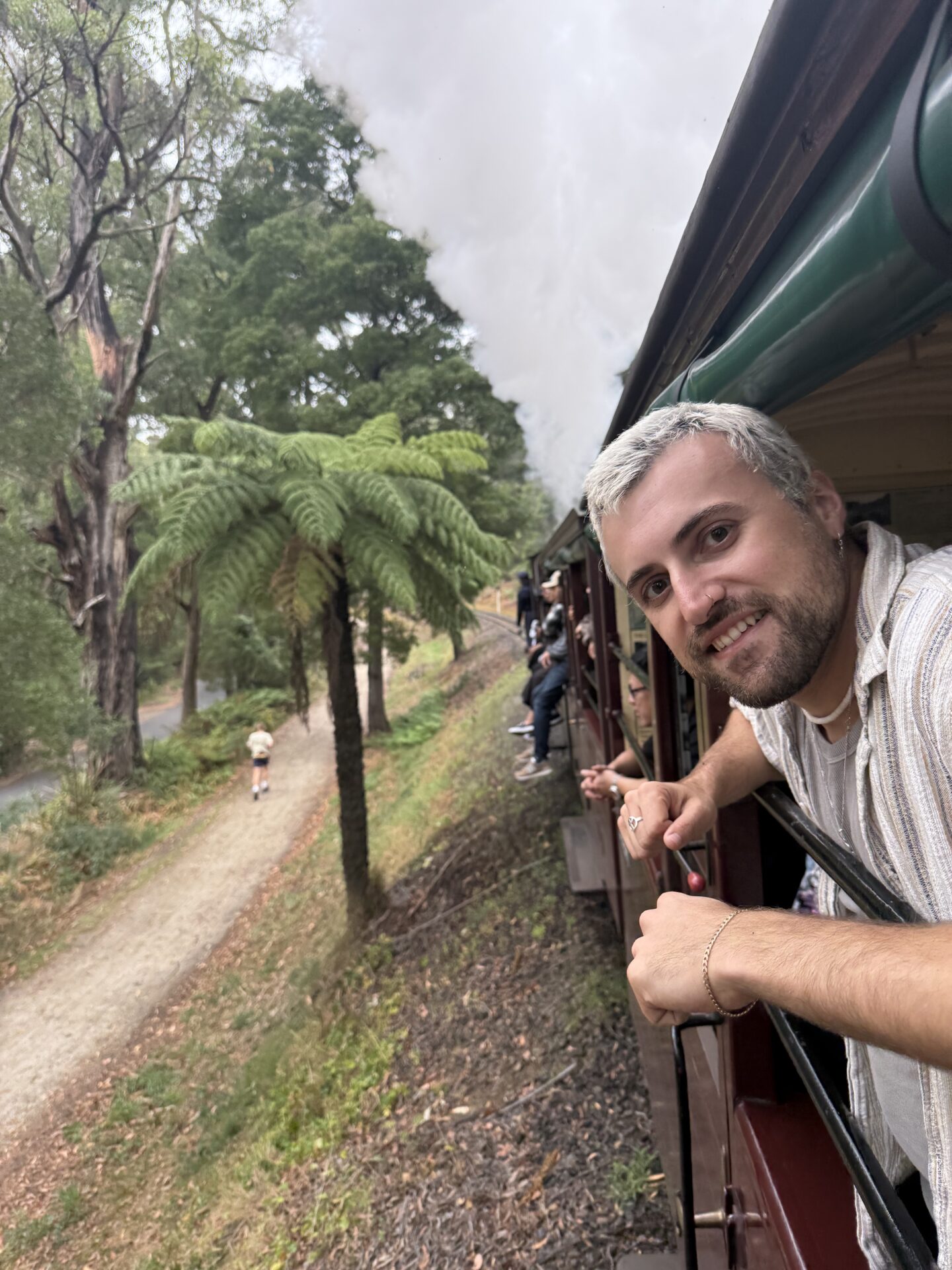 Autism Adventures Abroad - Alex onboard open side carriage Young autistic man onboard one of Puffing Billy's open side carriages.