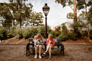 Puffing Billy Mum Daughter And Son Sitting At Menzies Creek Station