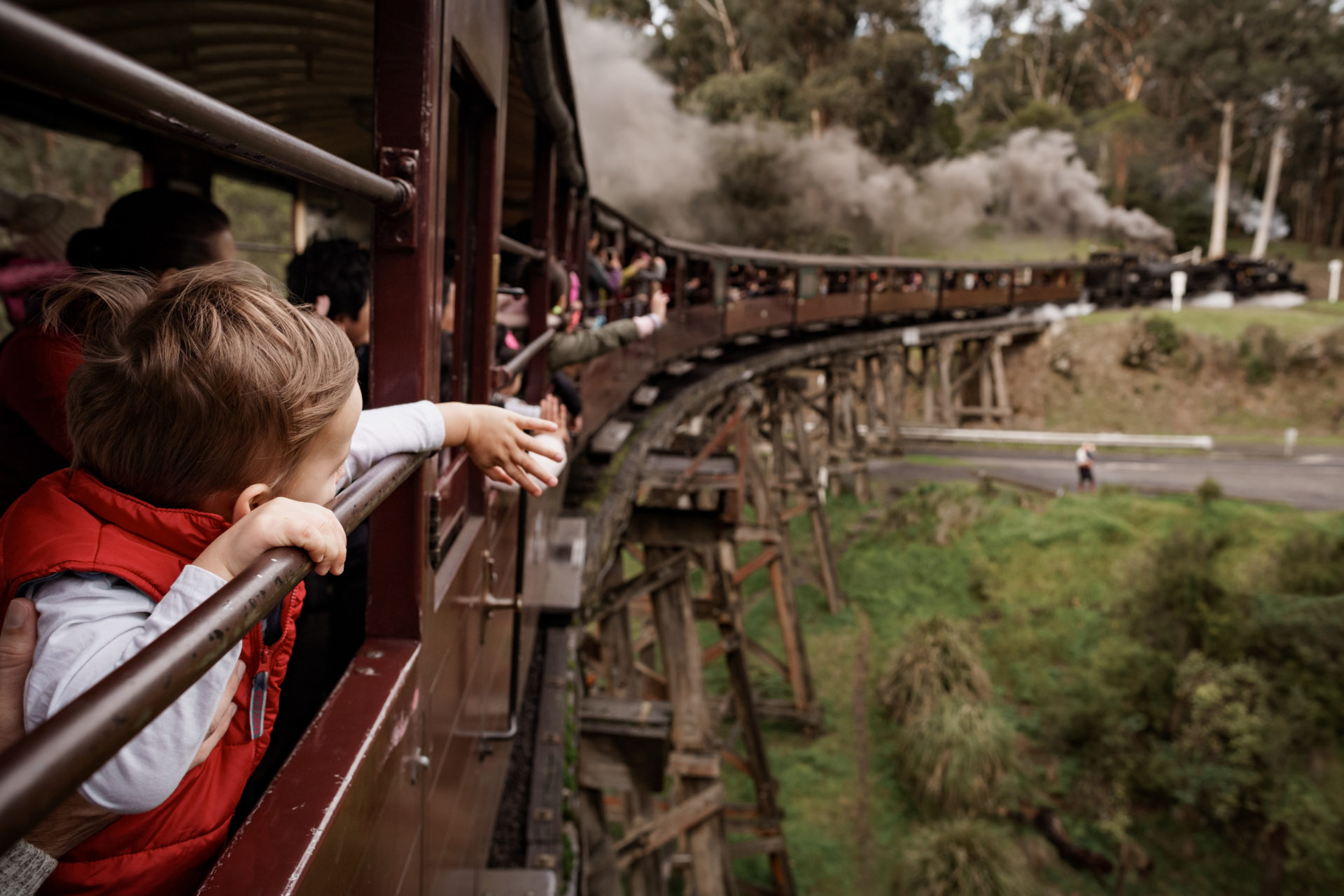 Puffing Billy Travels Over Bridge Boy Watches From Carriage