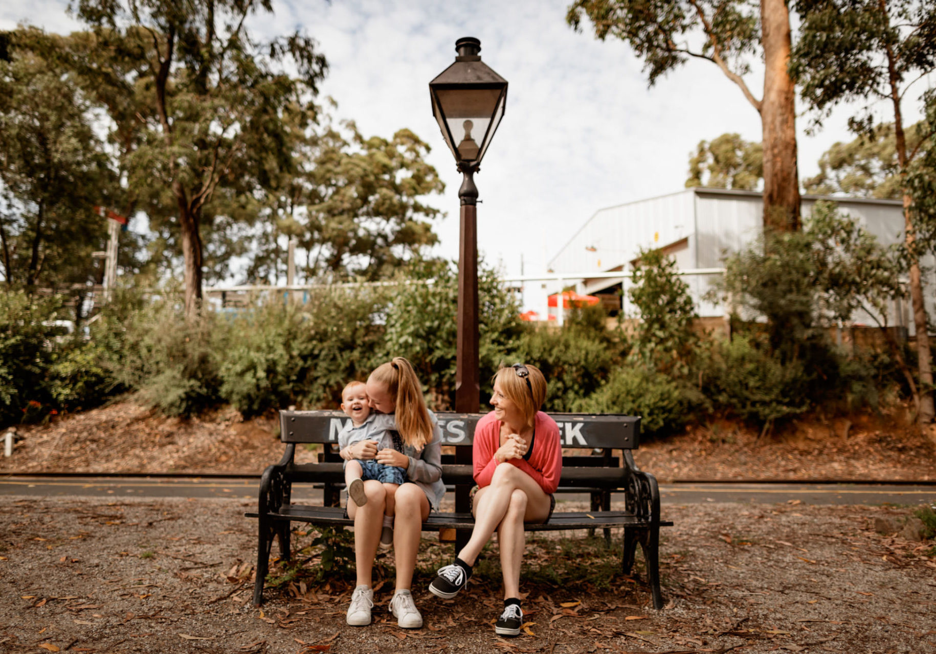 Puffing Billy Mum Daughter And Son Sitting At Menzies Creek Station