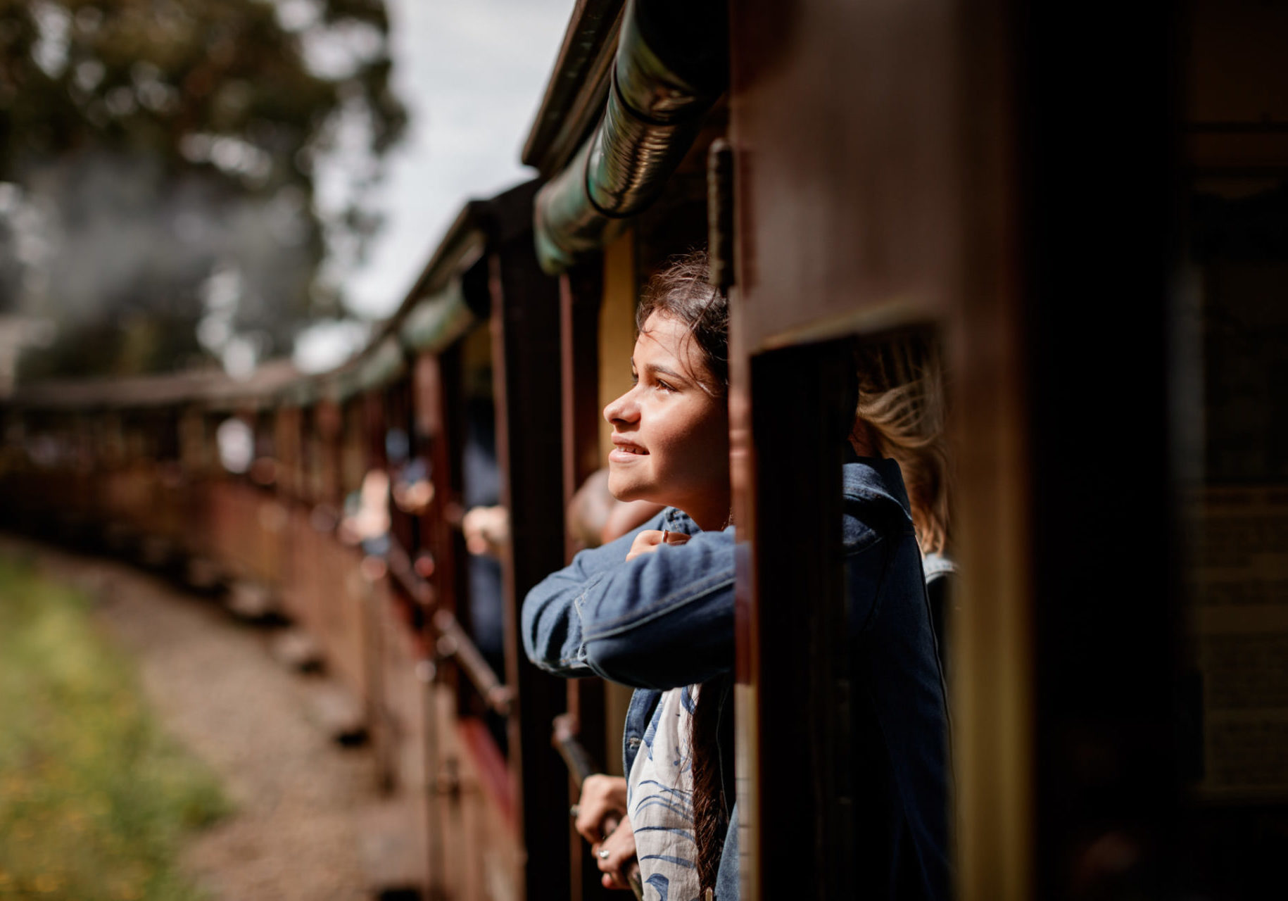 Puffing Billy - Teenage Girl Looking Out At View From Open Sided Carriage