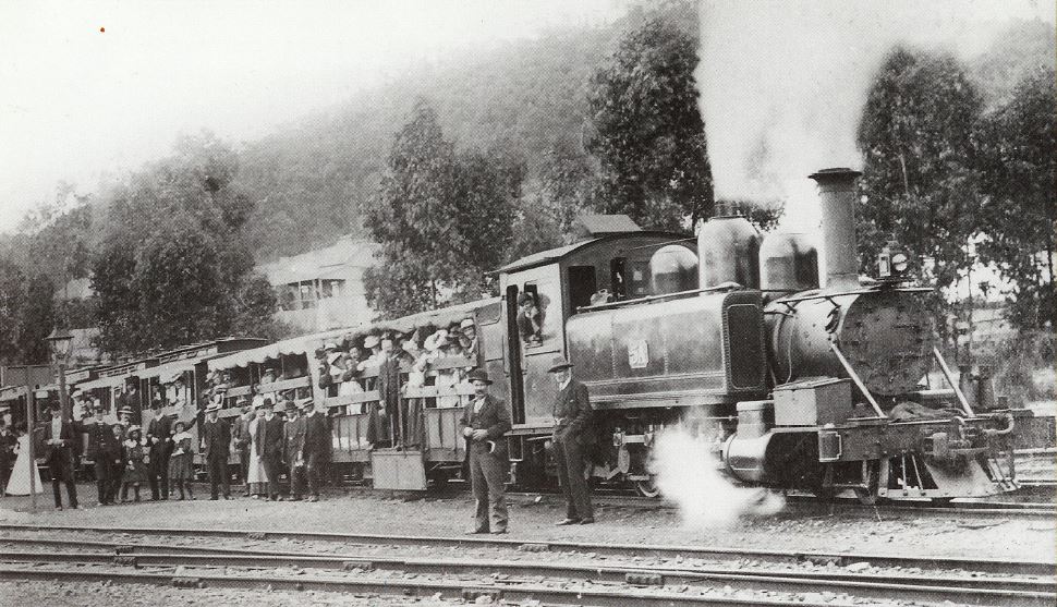 Excursion train about to leave Upper Ferntree Gully between 1908 and 1910. Before the popular NBH-class carriages were built, goods wagons were converted. Examples of these can be seen behind locomotive 5A.